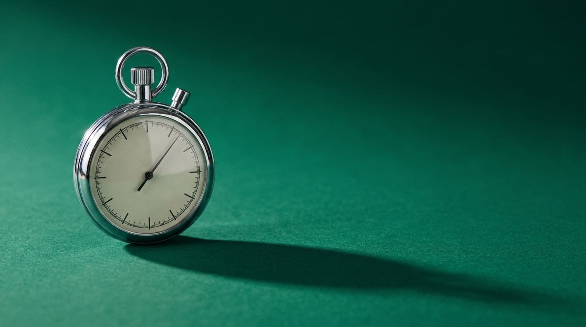 AI voice agent latency measured on real phone calls A vintage chrome stopwatch on an emerald-green backdrop casting a long shadow, representing AI voice agent response latency on real calls